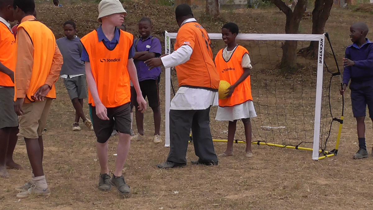 Kids in Malawi playing blind football