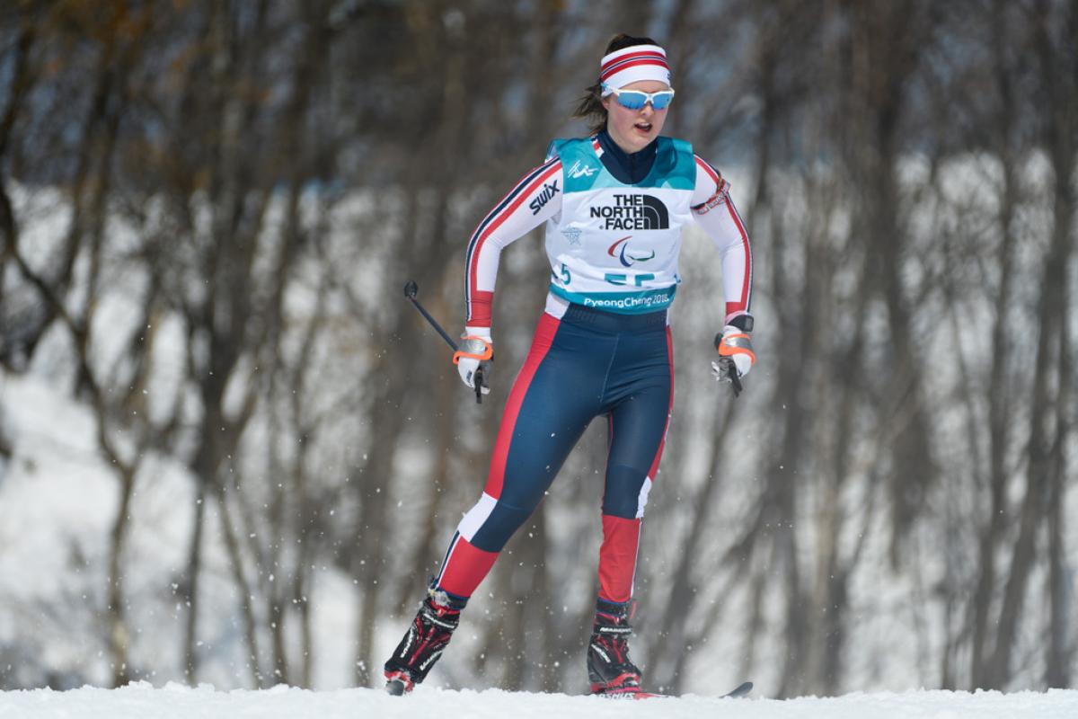 A female athlete competing in a Para cross-country event