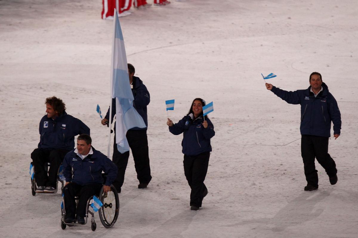 Jean Maggi carrying Argentina's flag at the Opening Ceremony of Vancouver 2010