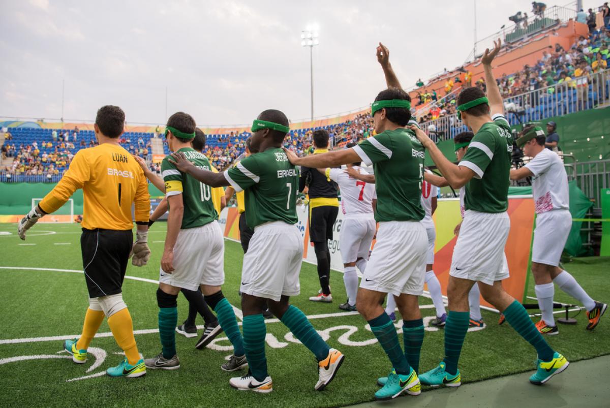 Brazilian football 5-a-side team entering the stadium