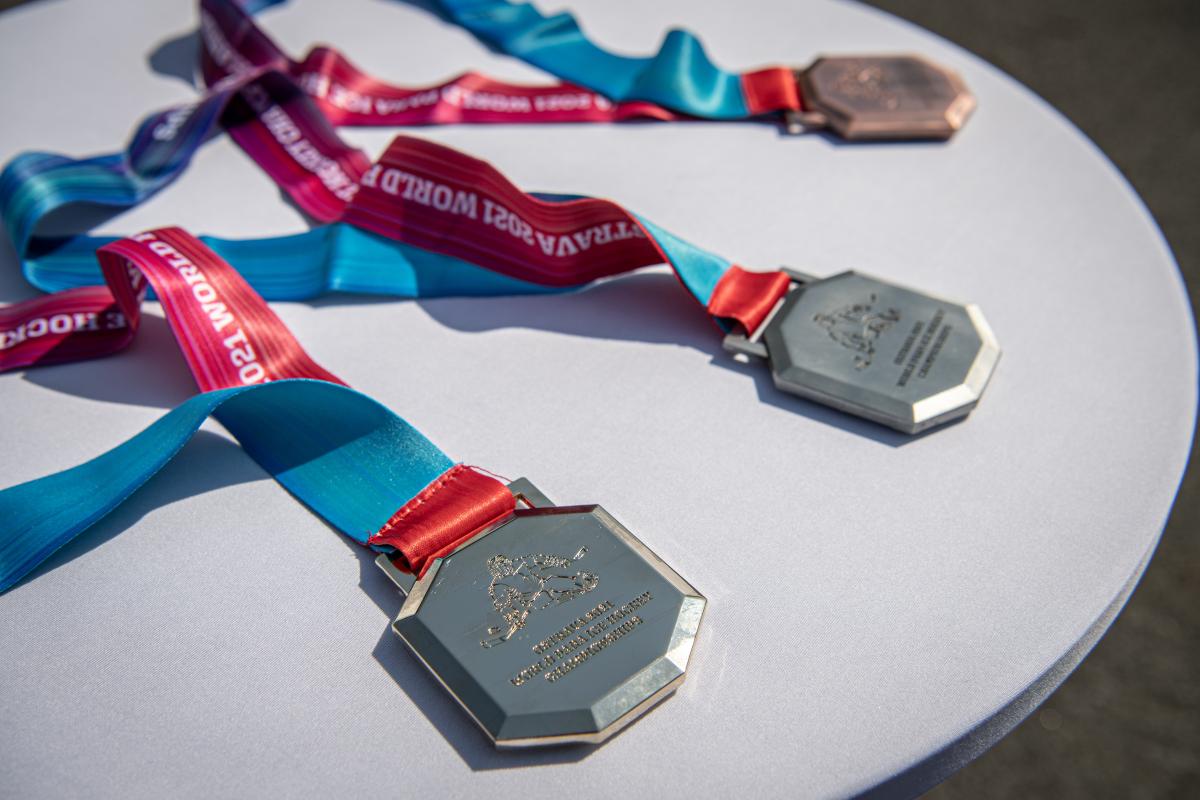 A table with three medals 