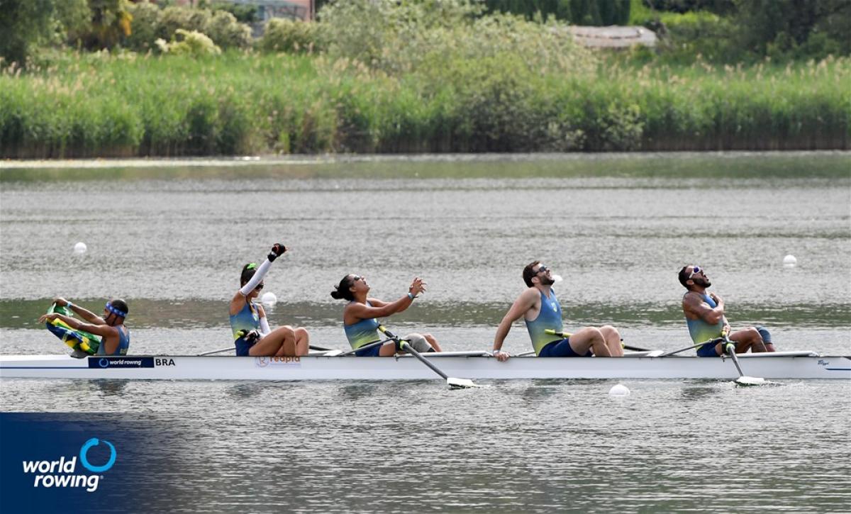 JUBILANT: Brazilian mixed coxed four team celebrates on boat after winning an event