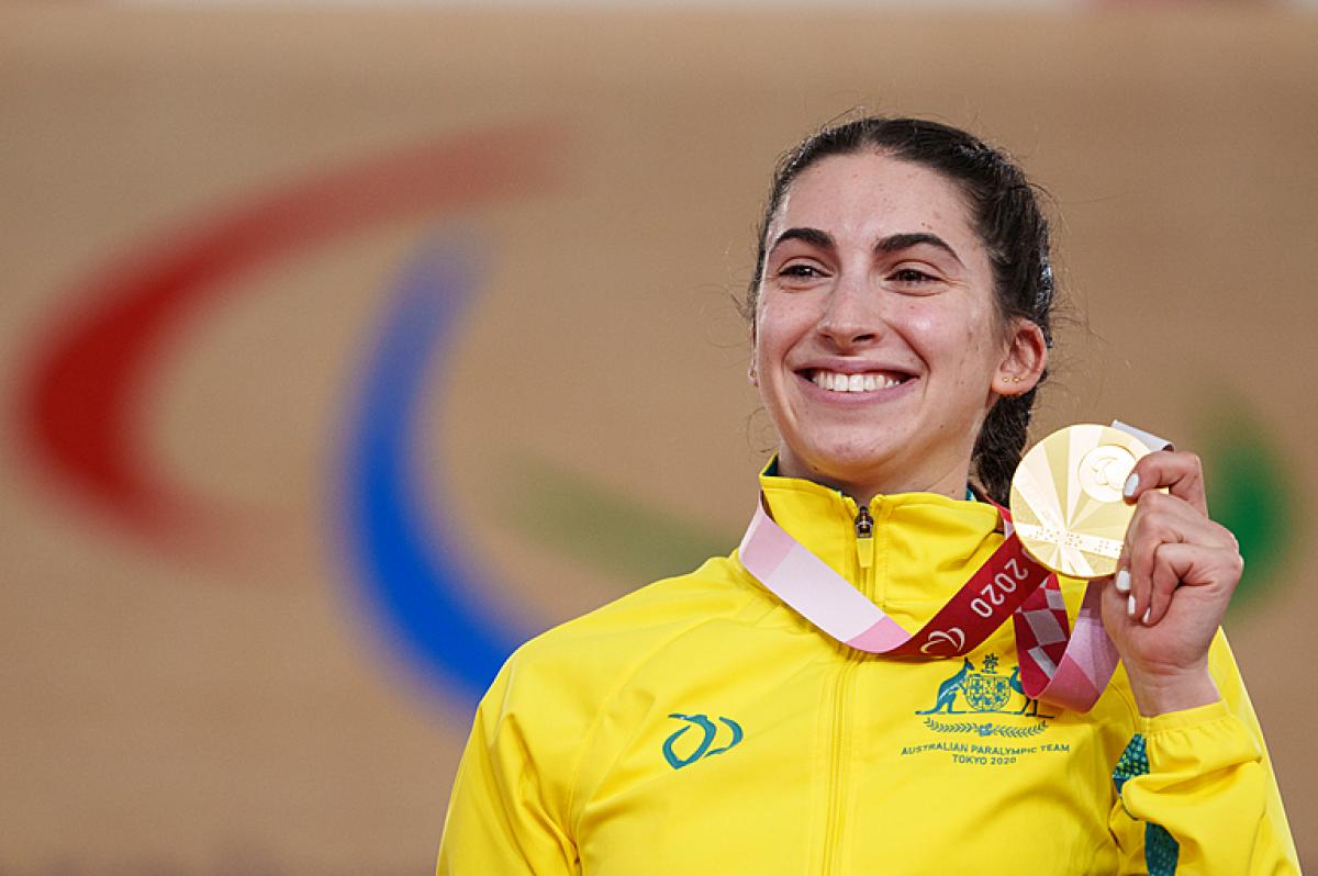Paige Greco displays her gold medal 