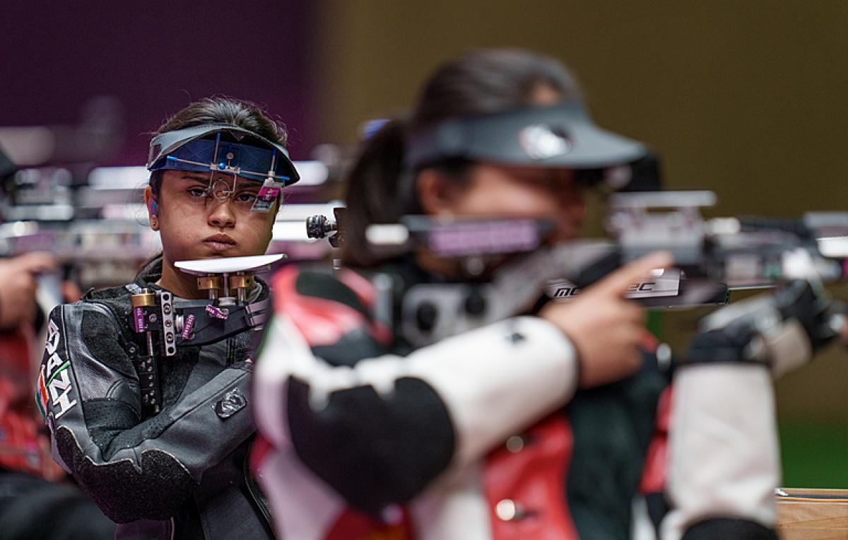India female shooting athlete on the range