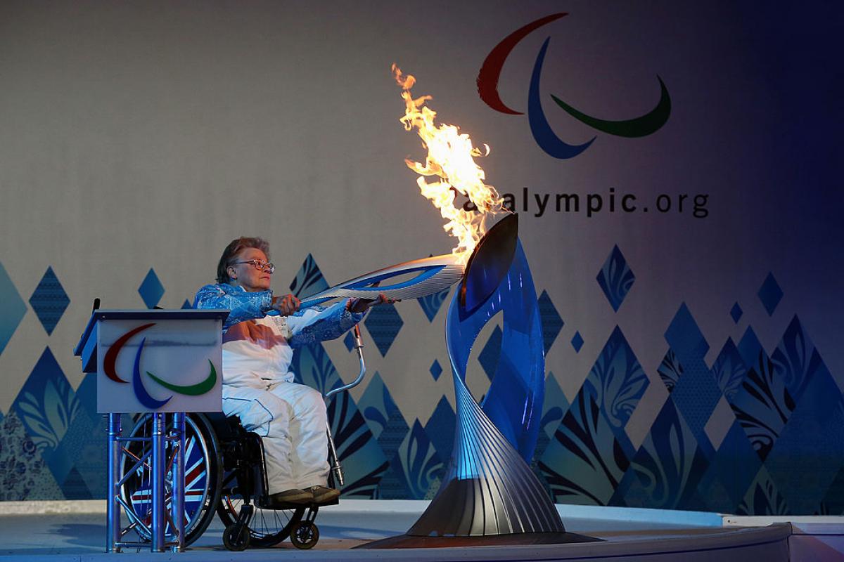 File photo of Paralympian Caz Walton lighting the torch during the Paralympic Heritage Flame lighting ceremony at Stoke Mandeville Stadium in England.
