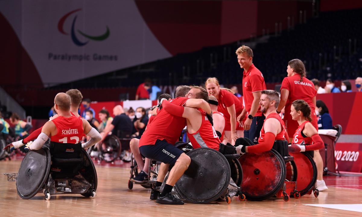 Danish wheelchair rugby team celebrating after beating powerhouses Australia