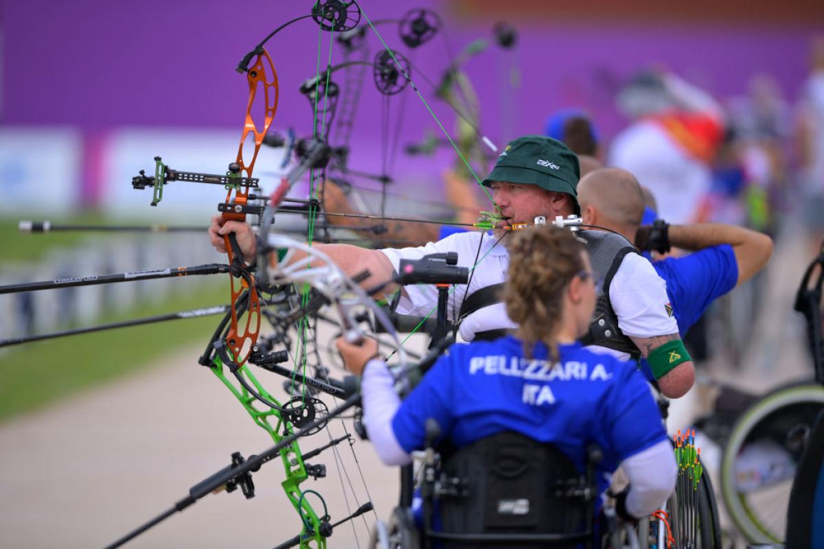 Row of archers in training