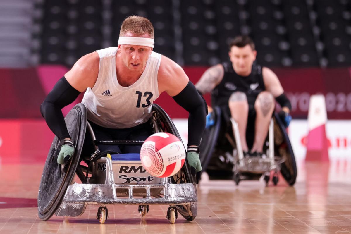 Phipps close up chasing the ball in his wheelchair