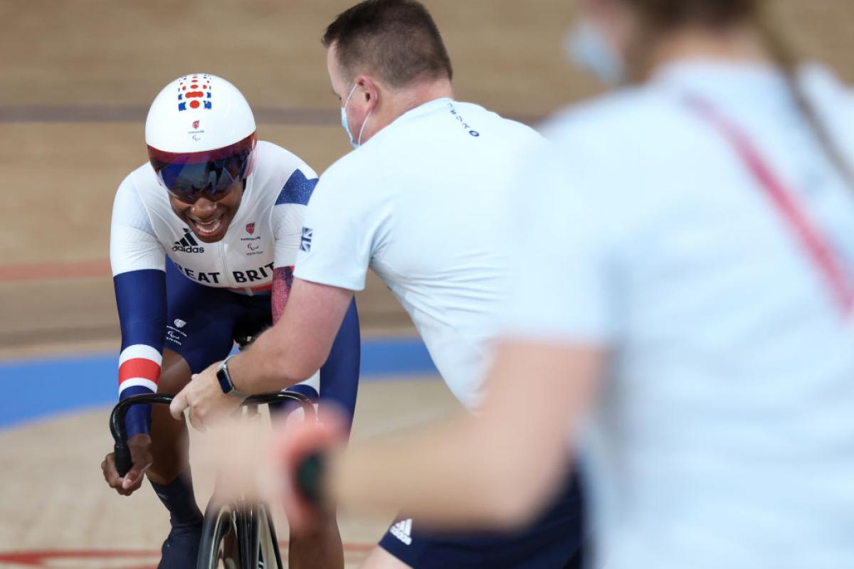 Woman on track cycle pushes to win