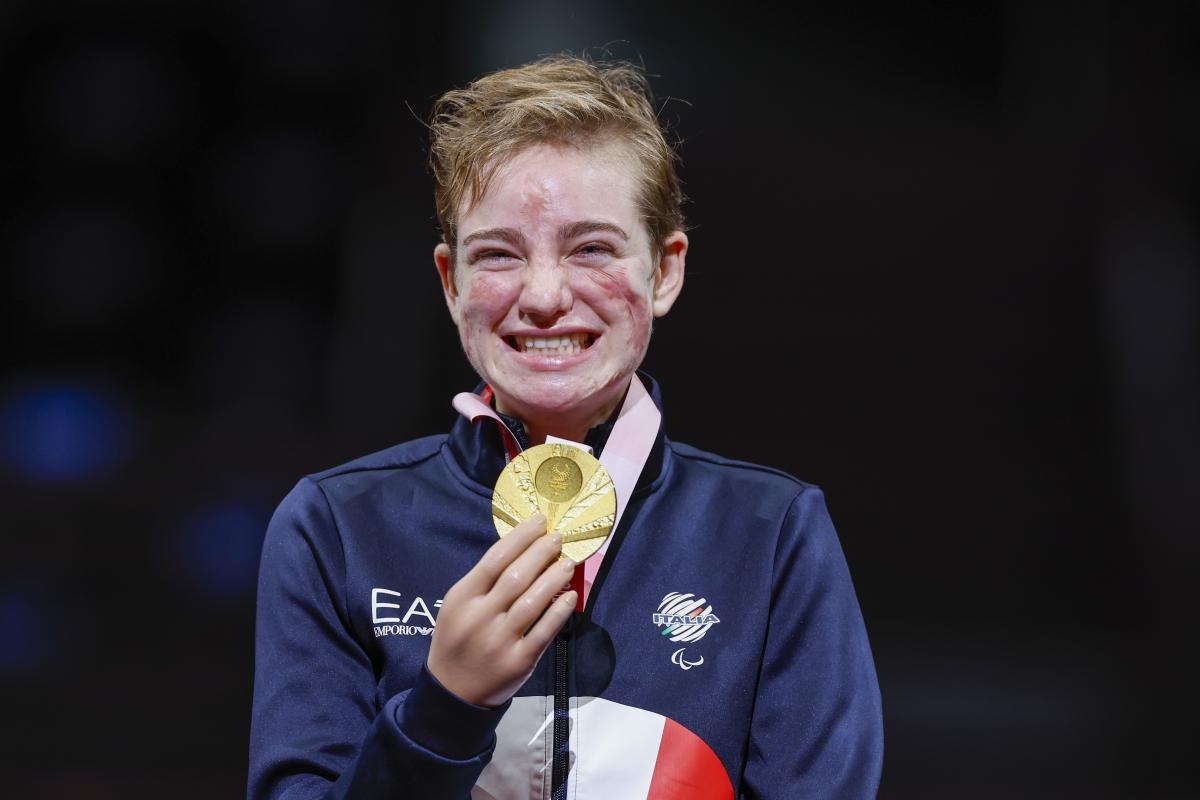 Italian wheelchair fencer Bebe Vio poses with her Tokyo Paralympic gold medal