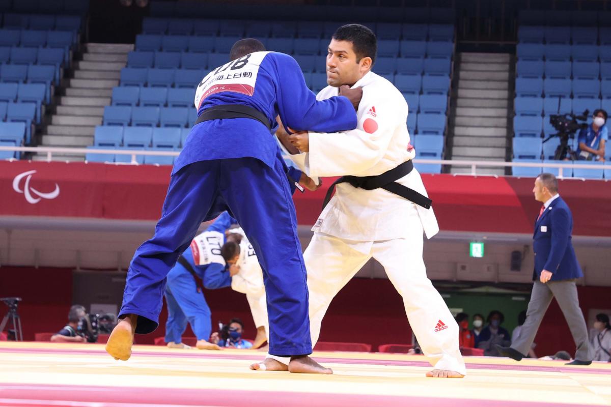 Peruvian judoka Fred Villalobos Corrales in action at Tokyo 2020 against Cuban opponent