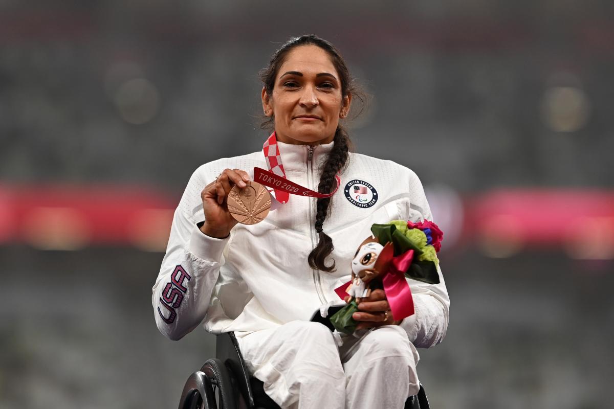 Cheri Madsen shows medal