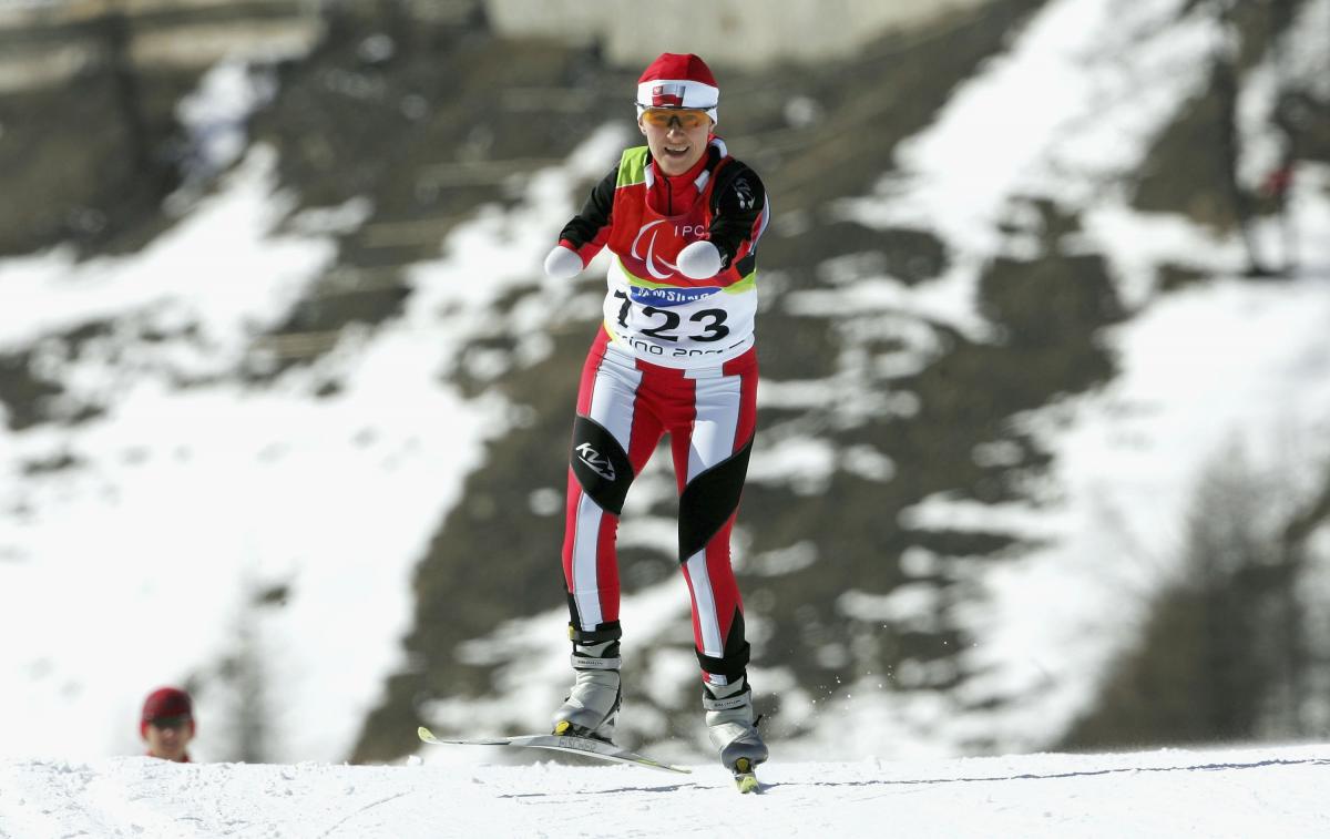 Polish Katarzyna Rogowiec smiles during the cross-country competition at Torino 2006
