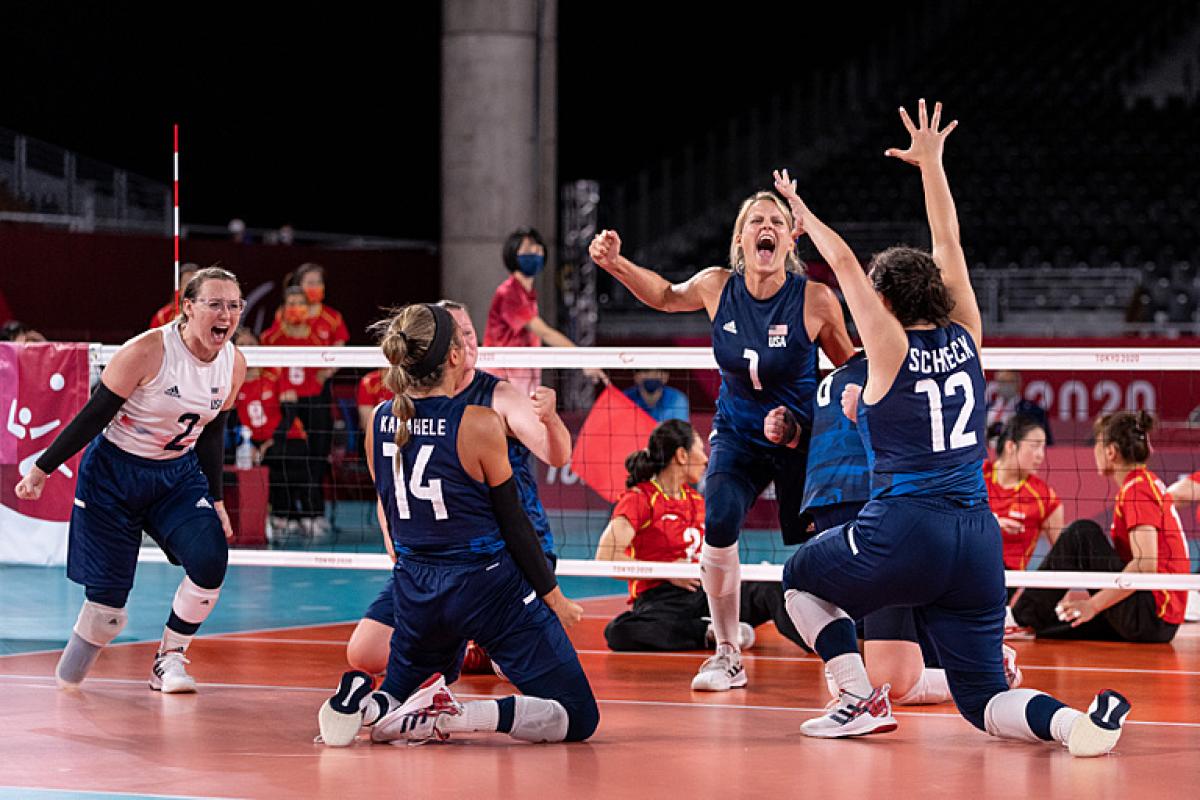 US female sitting volleyball team celebrates winning gold against China