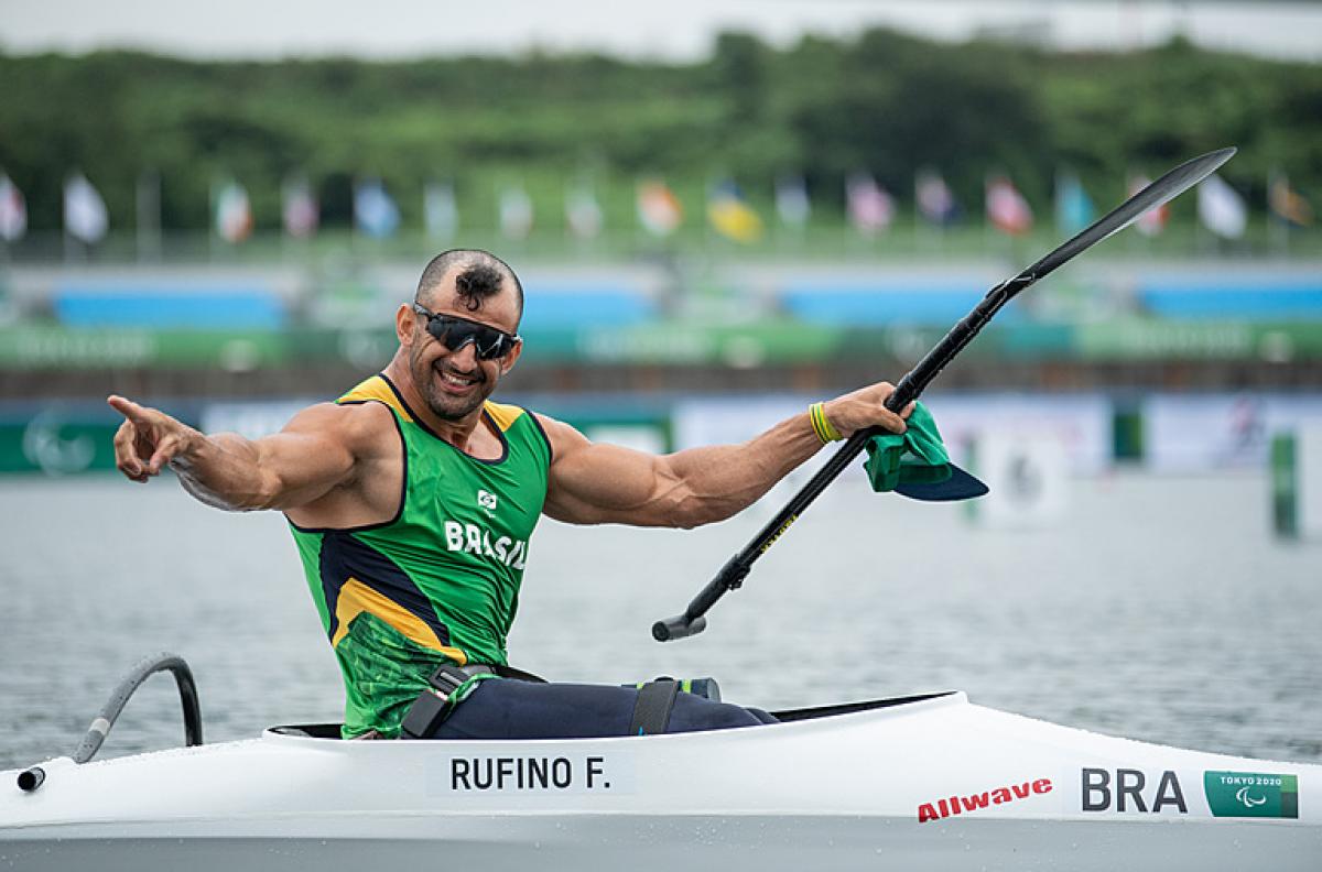 Male canoe athlete celebrates