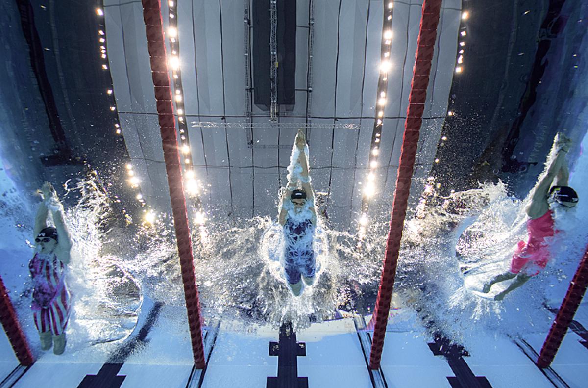 Underwater image of Morgan Stickney USA, Jessica Long USA and Nahia Zudaire Borrezo ESP competing in the swimming women's 400m freestyle - S8 final at the Tokyo 2020 Paralympic Games. 