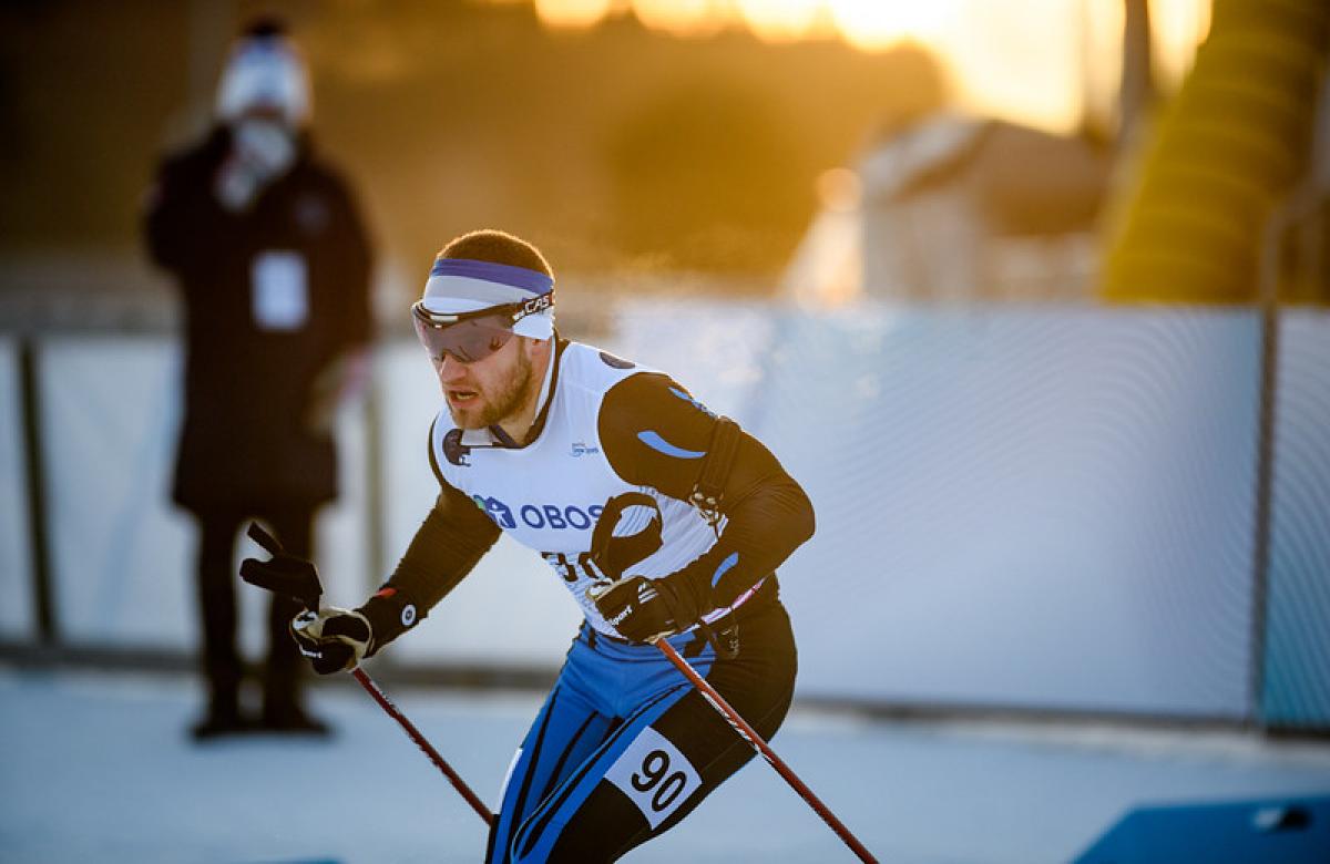 A male cross-country skier in a competition 