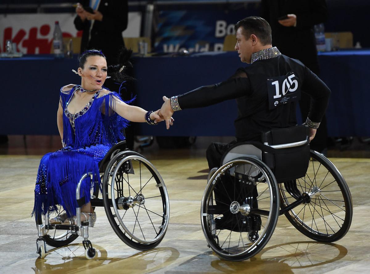 A couple of wheelchair dancers in a Para dance sport competition