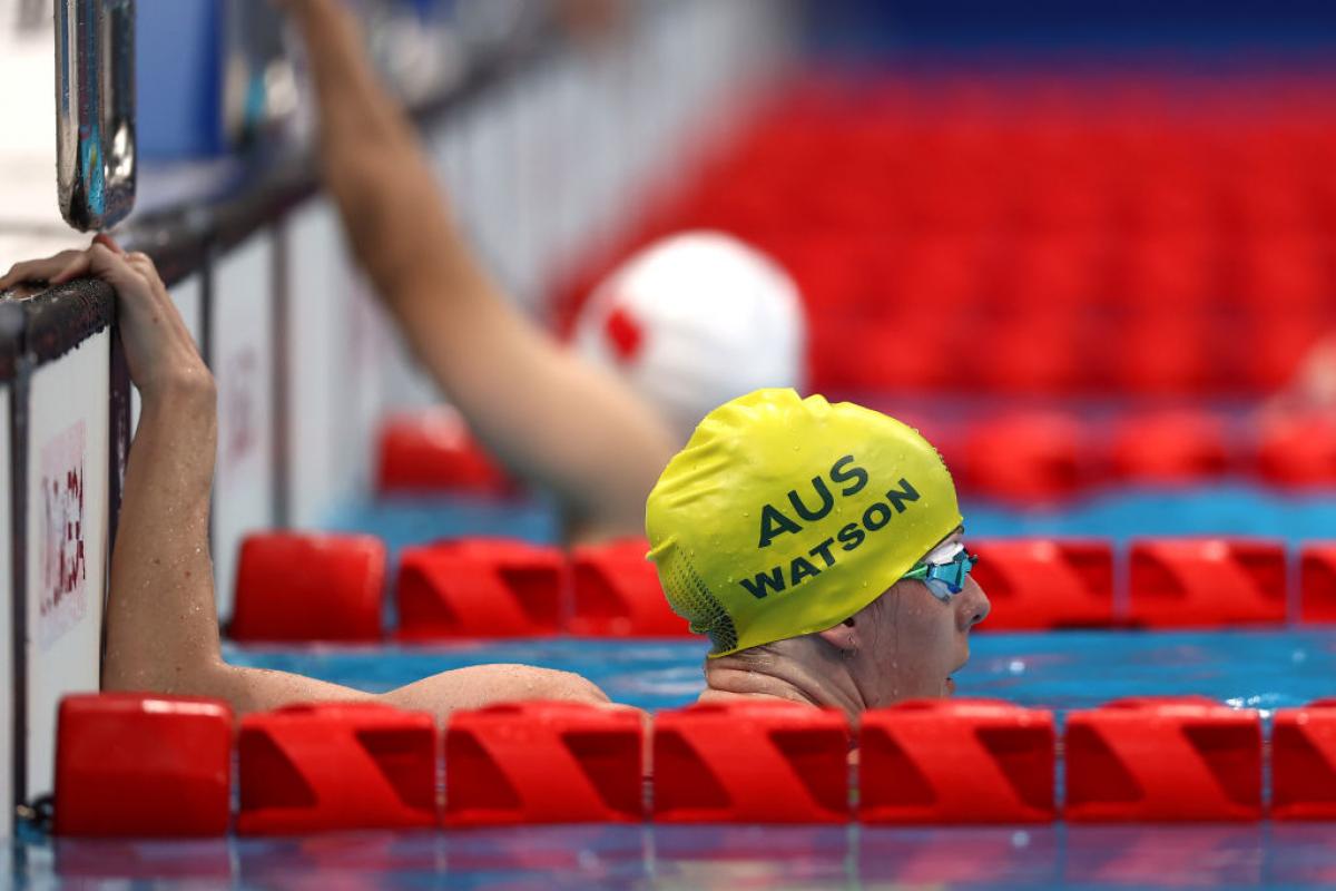 A female Para swimmer with an Australian swimming cap