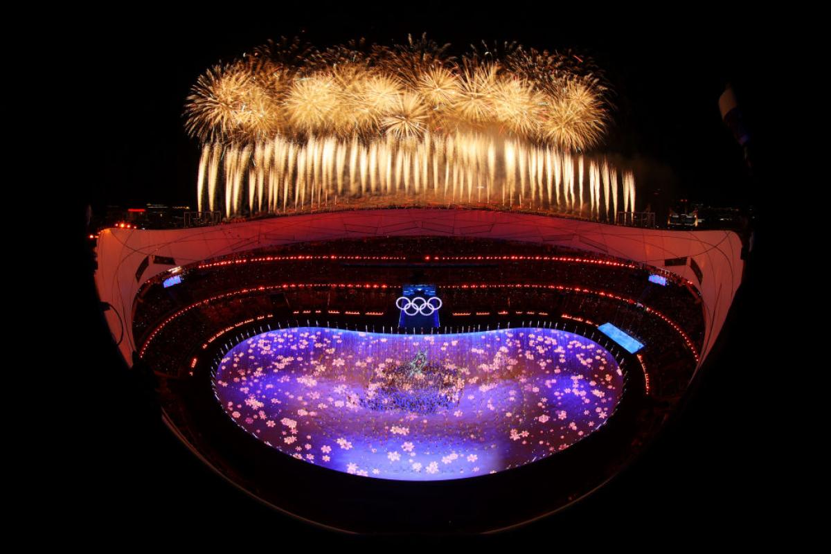 A firework display inside the stadium during the Beijing 2022 Winter Olympics Closing Ceremony. 