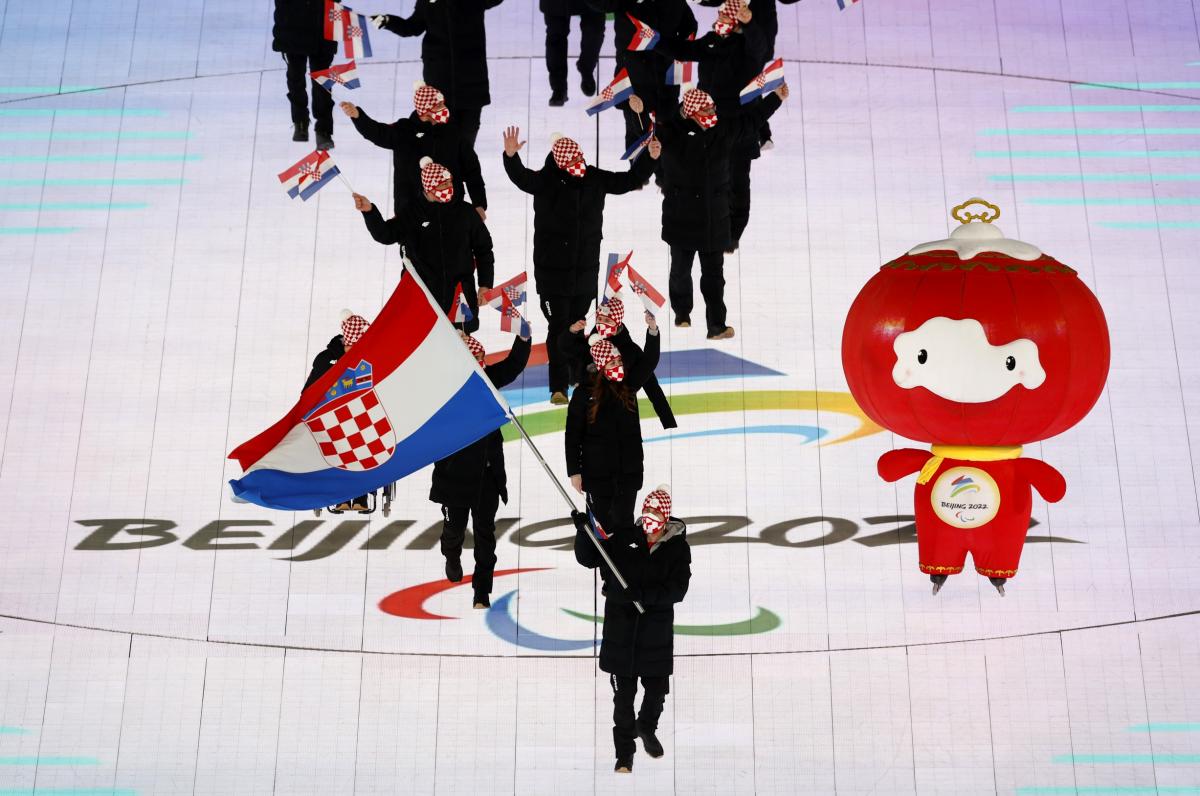 Bruno Bosnjak carrying the Croatian flag at the Opening Ceremony of Beijing 2022