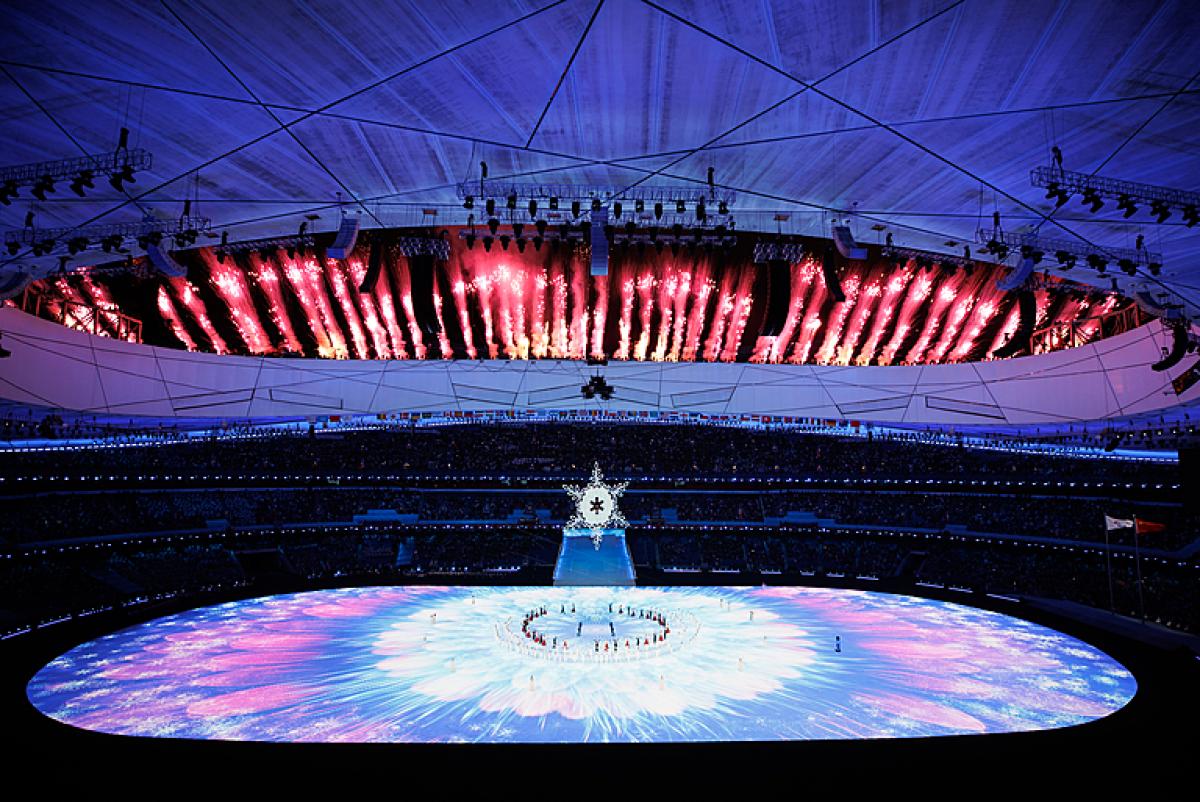 Fireworks can be seen from the inside surrounding the Birds Nest Stadium 