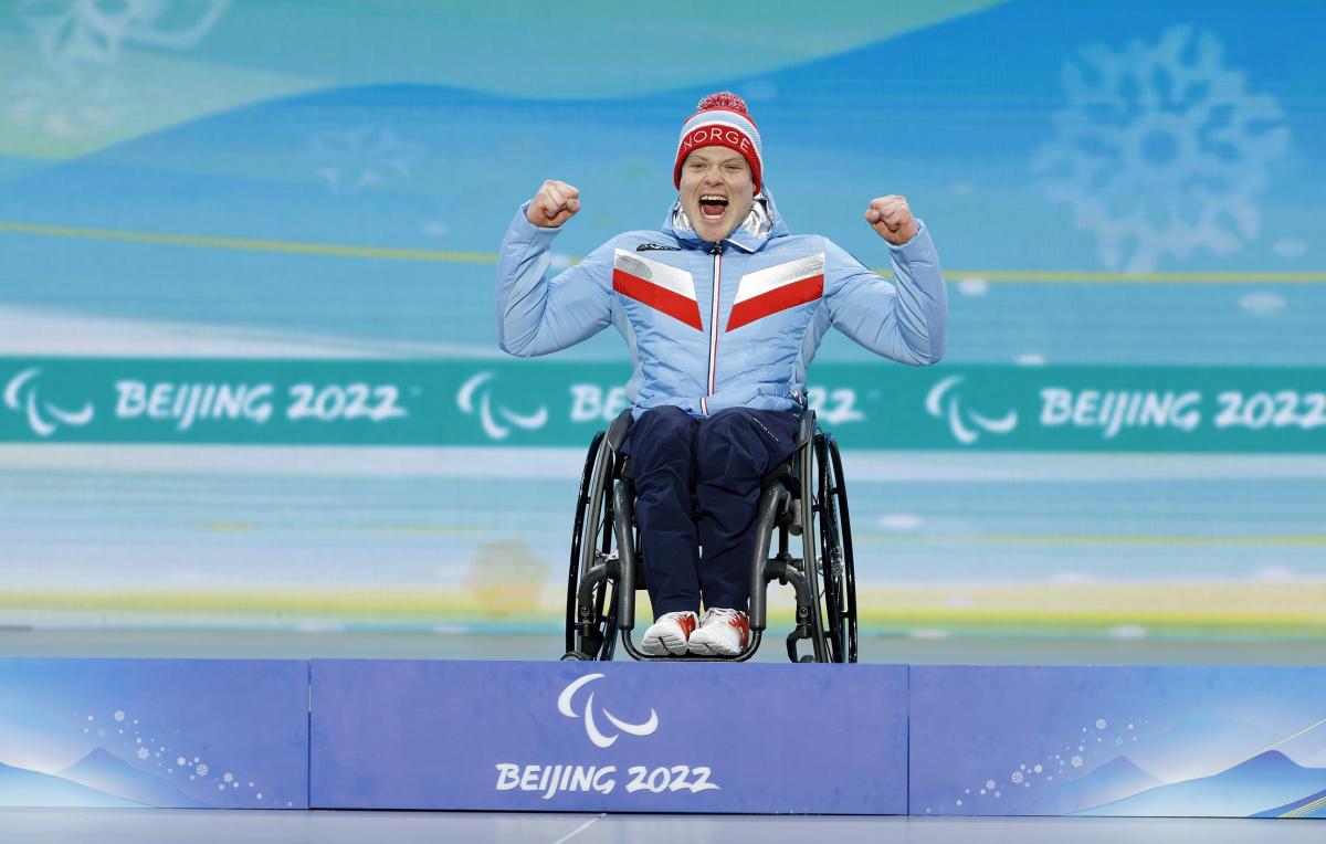 Jesper Pedersen celebrates on the Beijing 2022 podium 