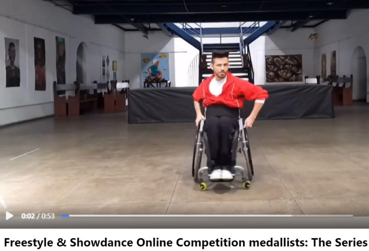 An image of a social media screen with a male wheelchair dancer