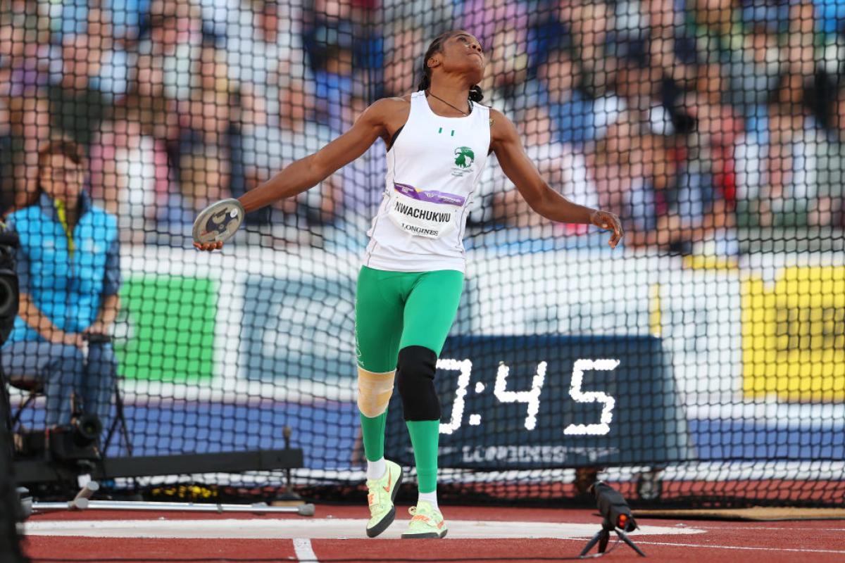 A female discus thrower during an athletics field event