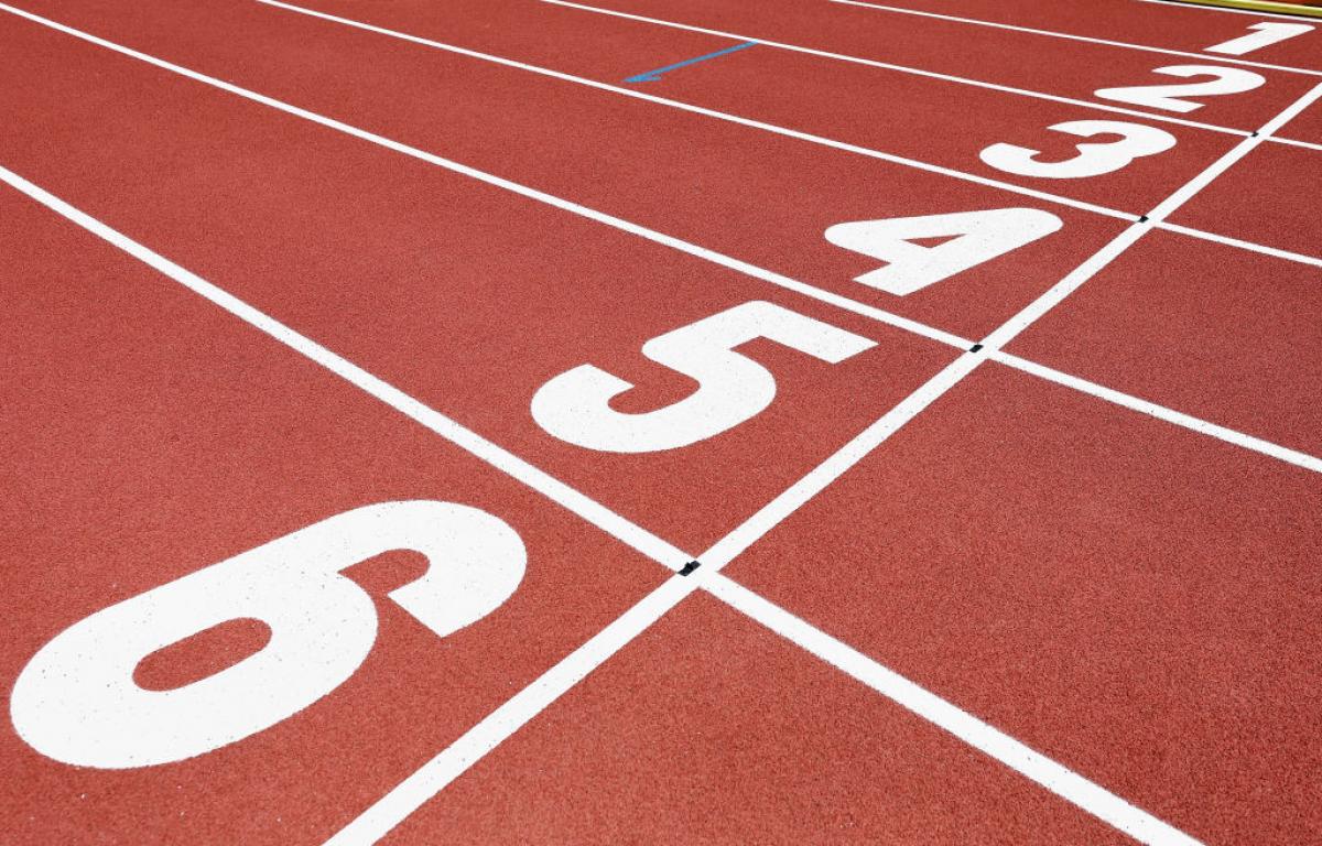 A red athletics track finishing line