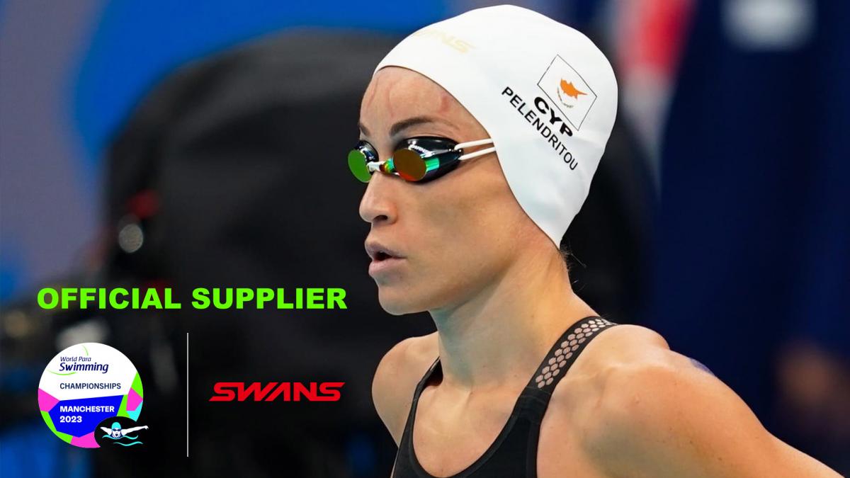 A female swimmer with a white cap and black swimsuit next to the Manchester 2023 and Swans logos
