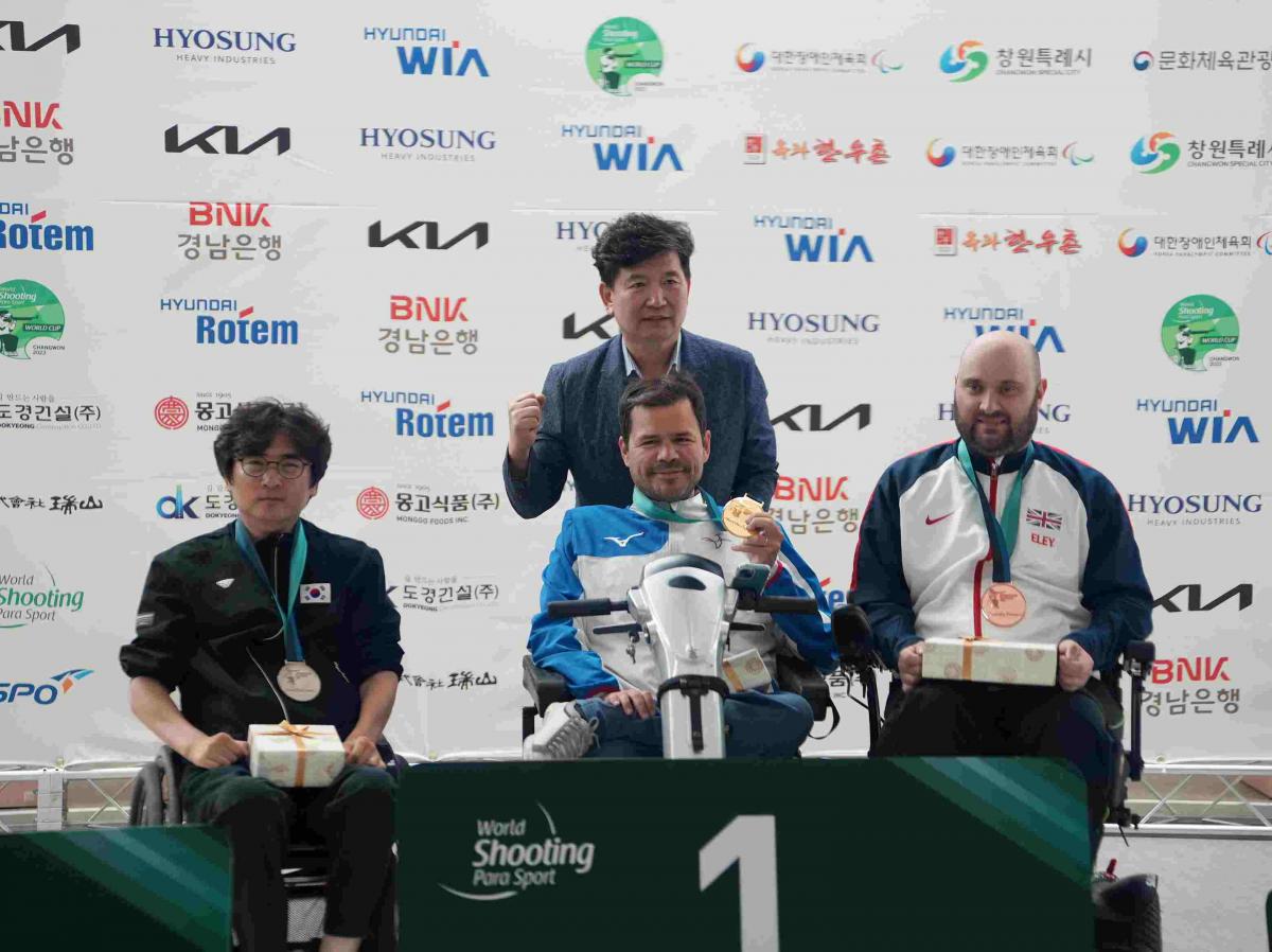 Tanguy De La Forest (centre), the reigning double world champion, continued his amazing run of form from last year's Al Ain 2022 World Championships to clinch three gold and a world record with his effort of 254.7 in R4 - mixed 10m air rifle standing SH2. 