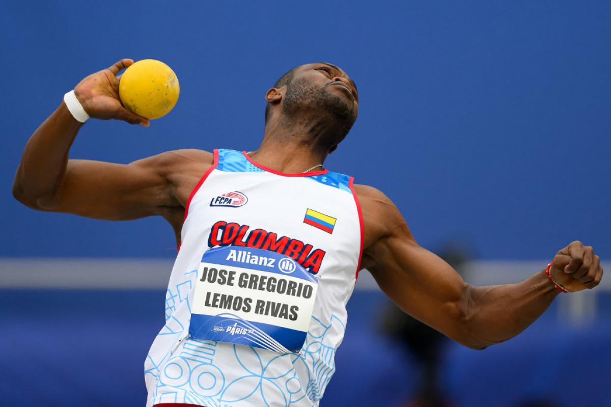 A man throwing in a shot put competition