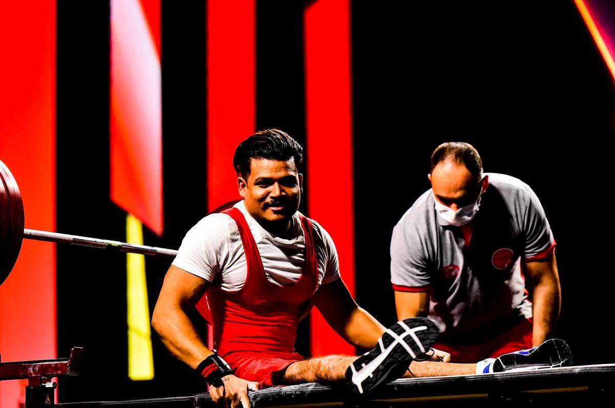 A Powerlifter in a bench after a successful lift.