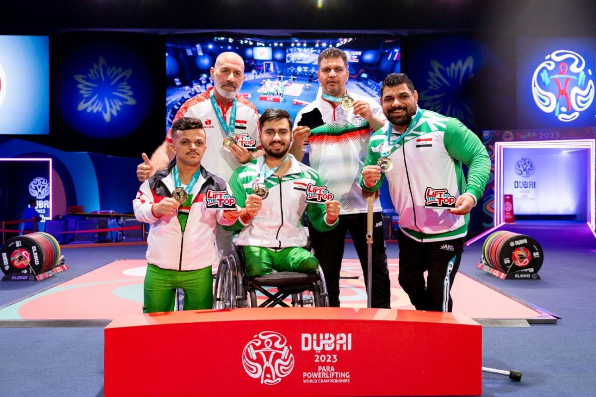 A group of five men on the podium of the Dubai 2023 Para Powerlifting World Championships