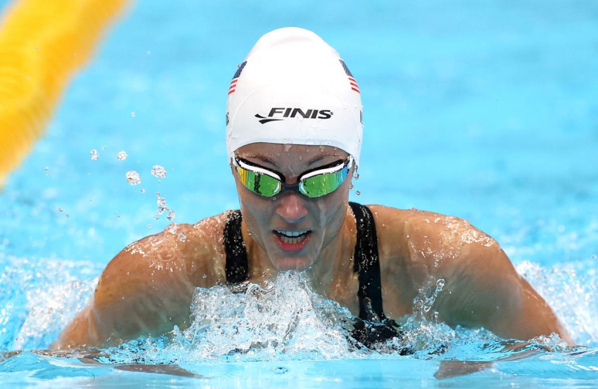 A female Para athlete swims
