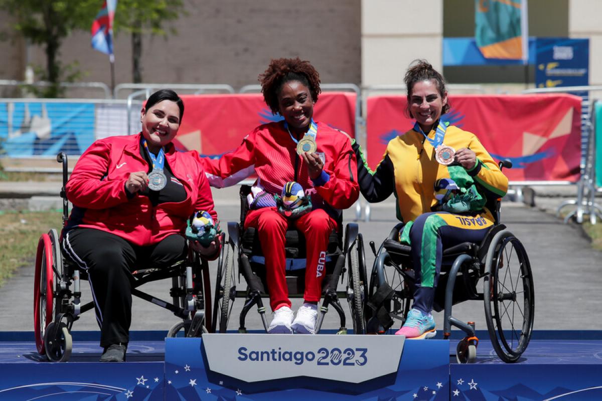 Three women on a podium at the Santiago 2023 Parapan American Games
