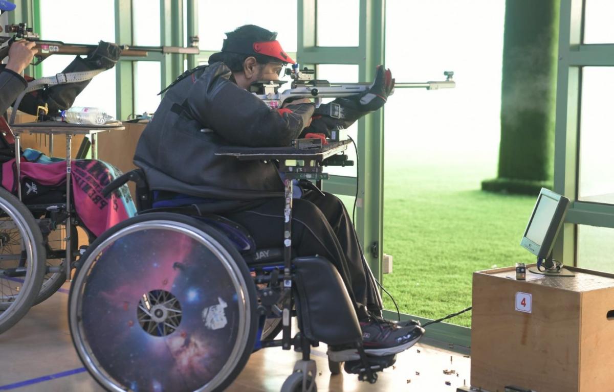 A rifle shooter in a wheelchair 