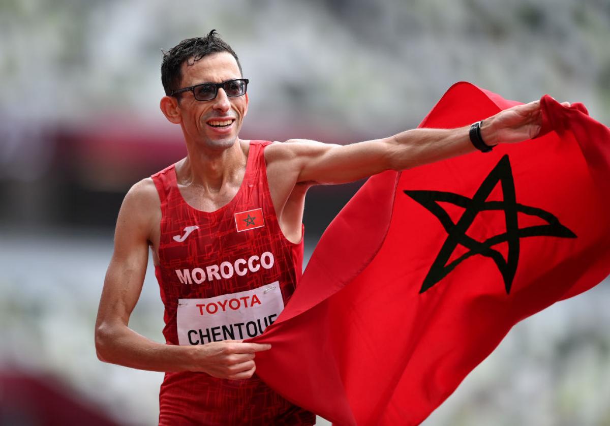 El Amin Chentouf celebrates with the Morocco flag