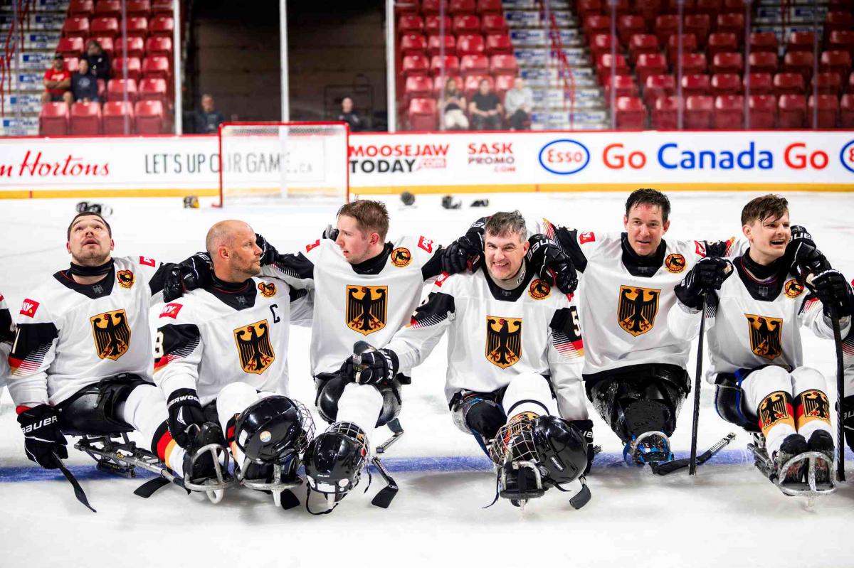 Athletes strike a pose for a group picture