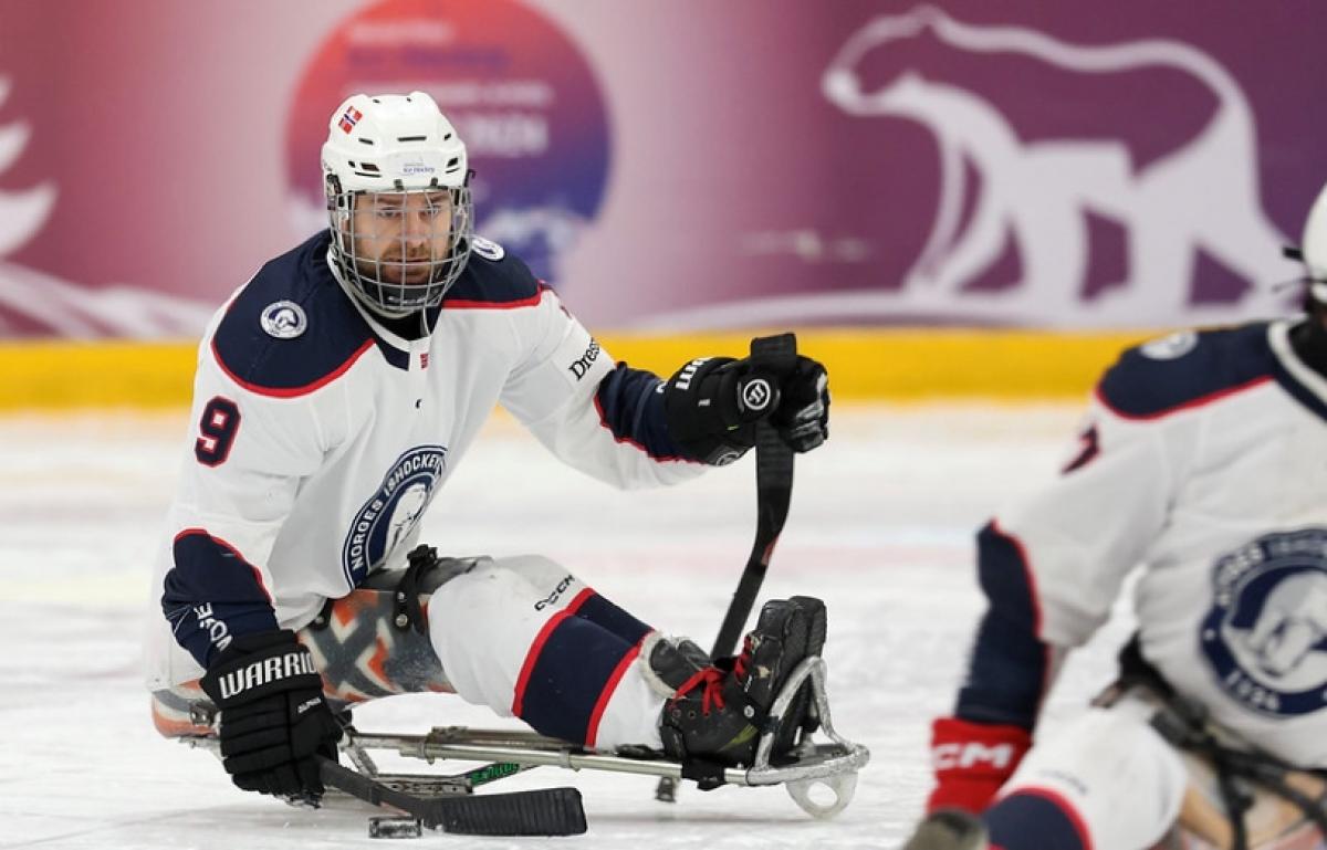 A Norwegian Para ice hockey player in a game