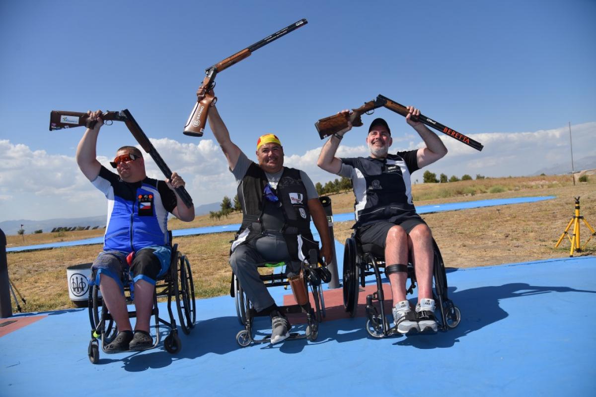 Athletes celebrate on podium