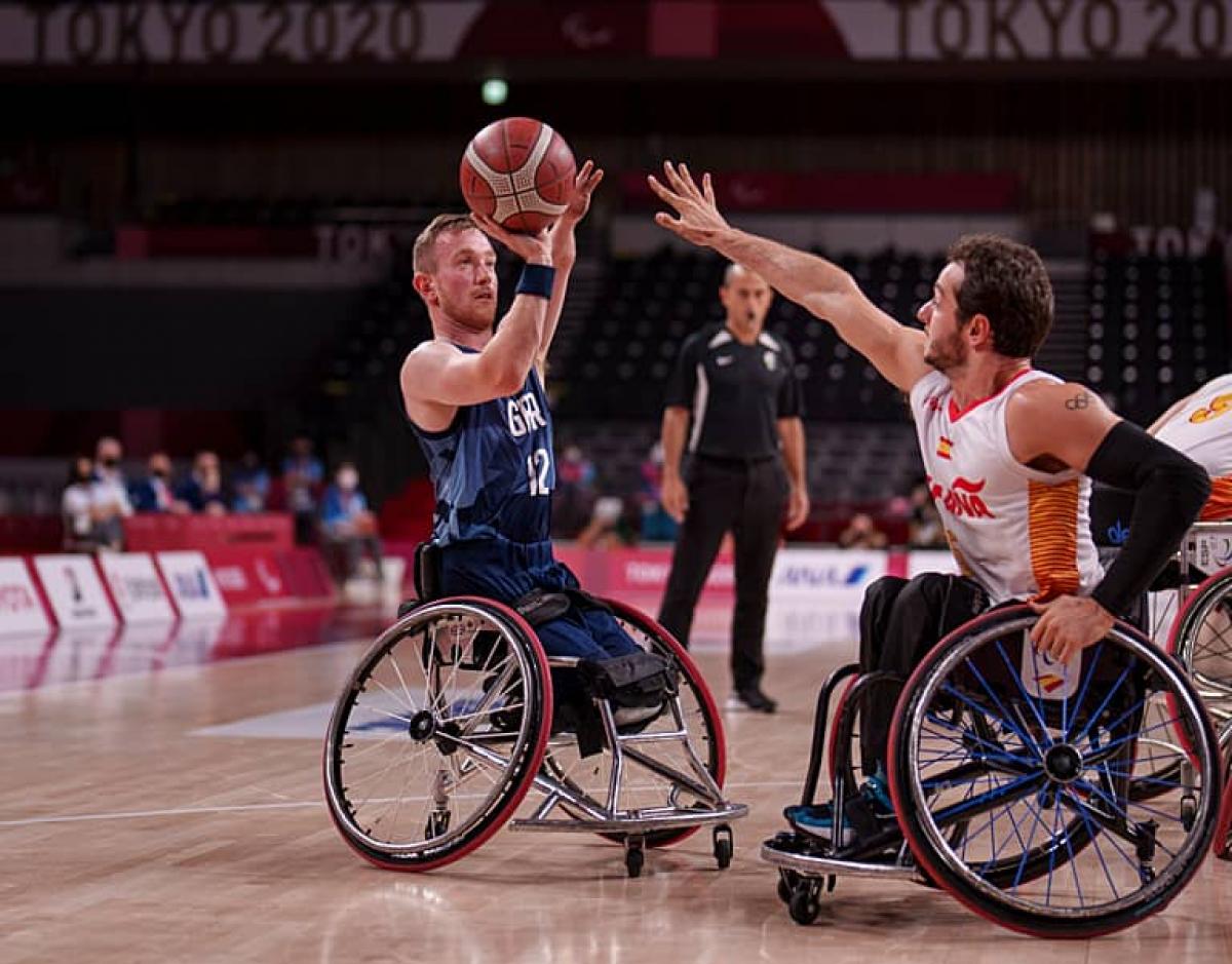 Wheelchair basketballer Gregg Warburton lines up a shot at the basket