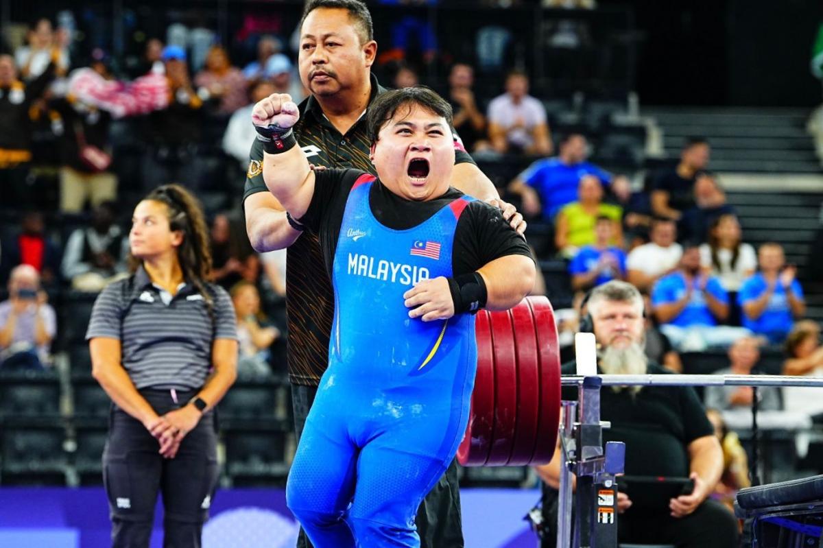 An athlete celebrate his win
