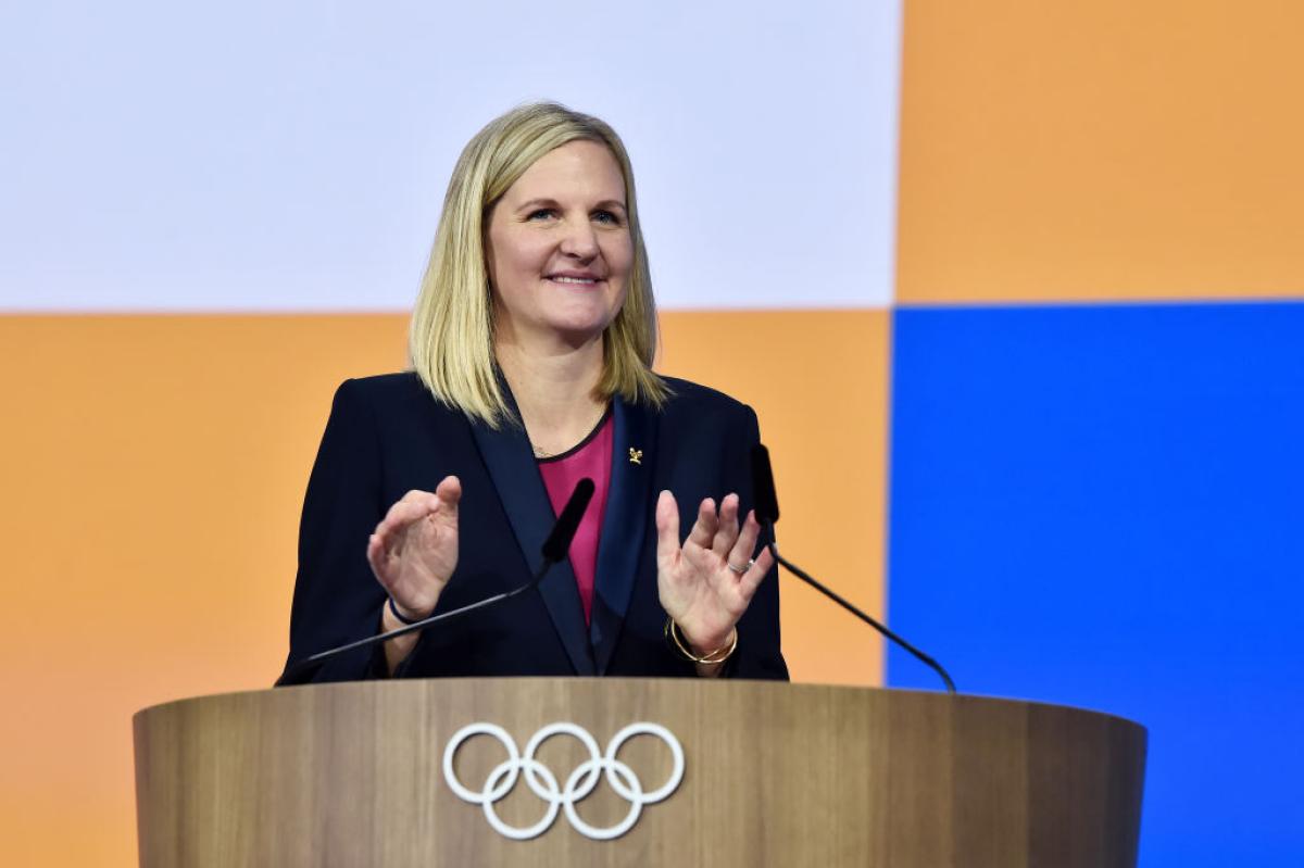 A female official is speaking in a press conference.