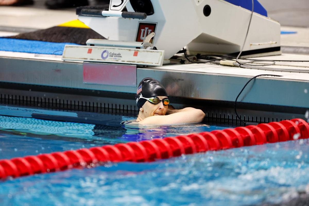 A female Para swimmer inside the pool