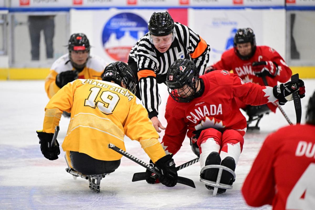 Canada and China playing a Para ice hockey game