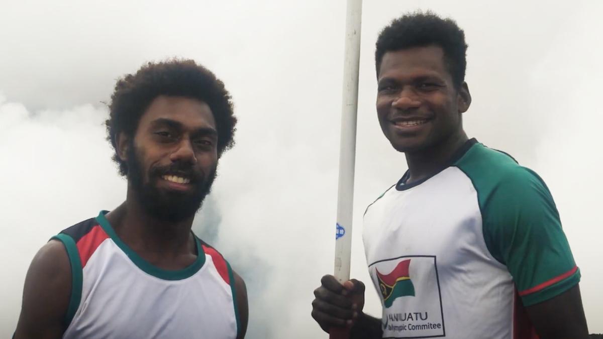 Two male athletes side by side