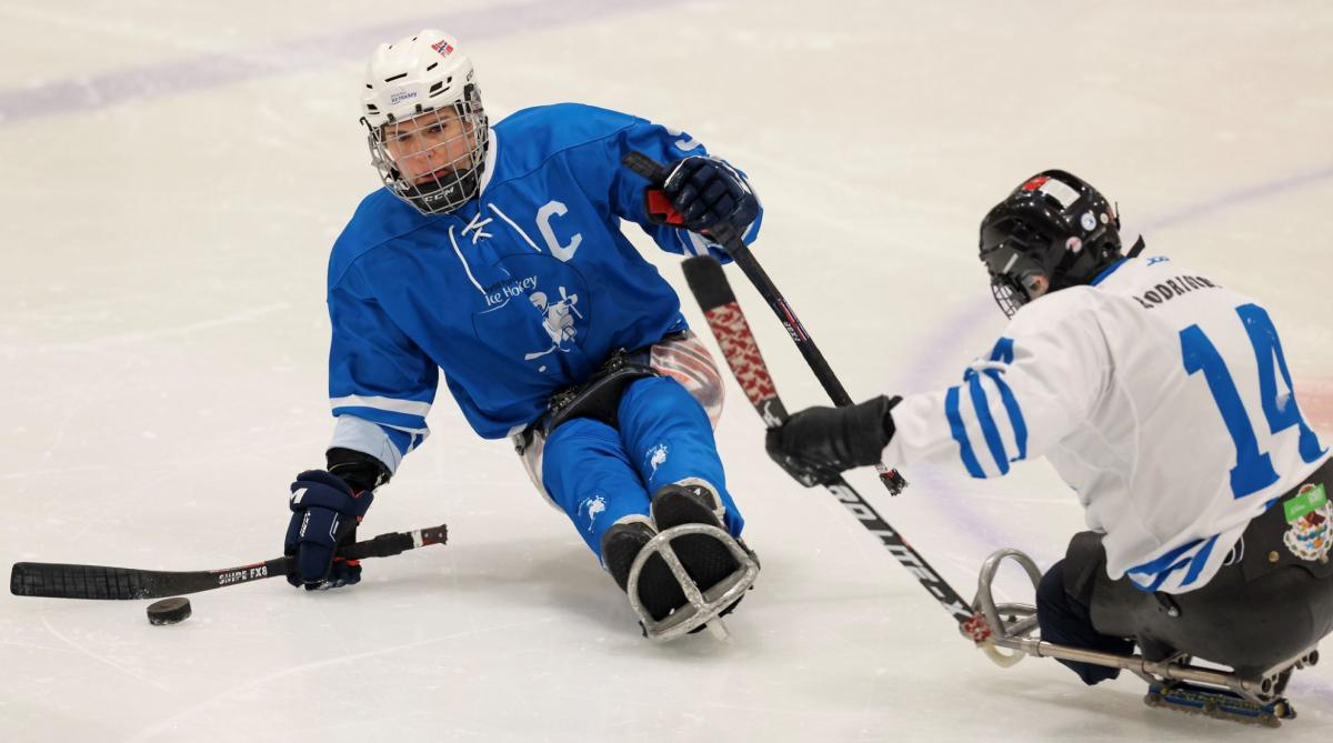 Para Ice hockey athletes in action