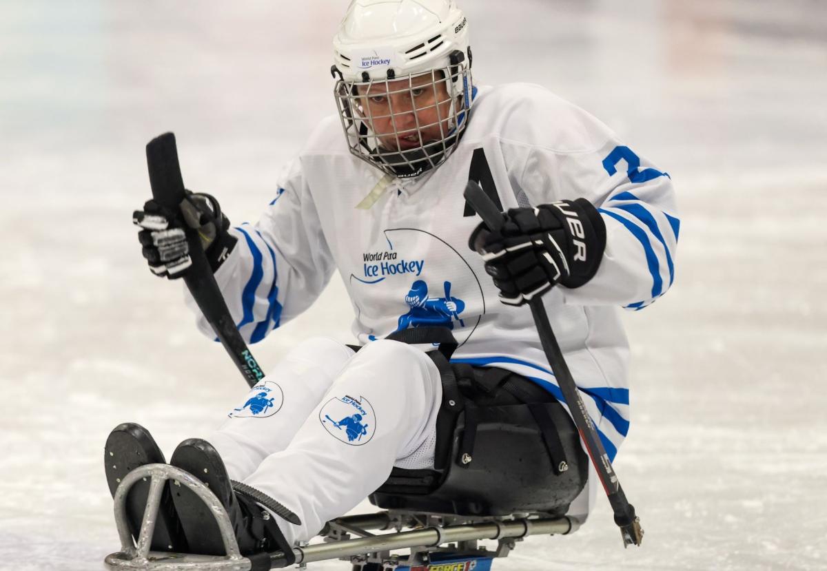 A female Para ice hockey player during a game